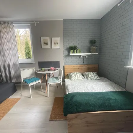 Quarto em Acomodações Particulares Przy Parku