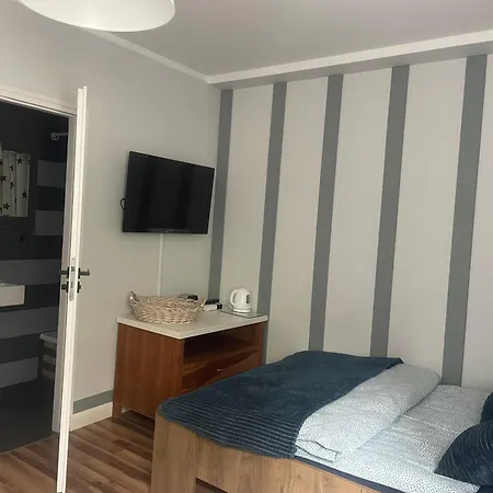 Quarto em Acomodações Particulares Przy Parku *